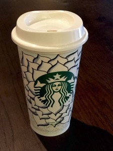 Starbucks cup embellished with the tangle Cyme. I used a Sharpie fine marker for the wide lines, and a Faber Castell permanent "S" for the finer lines. The shading was created with a Copic colorless marker which "melted" the existing lines so I could pull the diluted ink into the white areas.